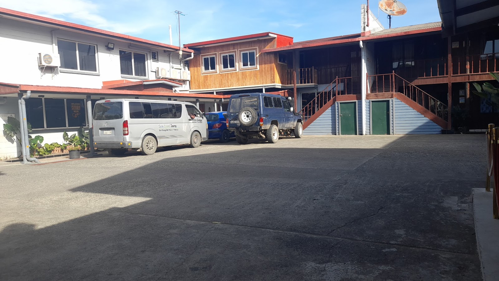 Mavra Lodge courtyard and building exterior